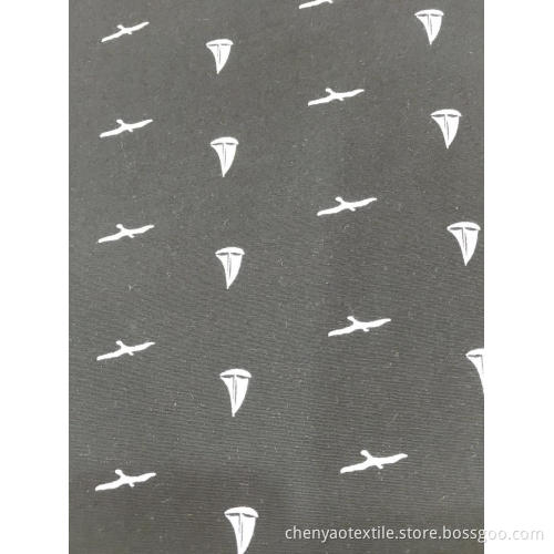 Tissu imprimé 97% coton 3% stretch, pigment uni